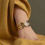 Modern dual tone sculptural cuff bracelet