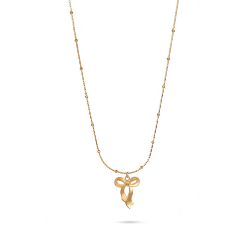 Delicate golden bow charm necklace with a slim beaded chain