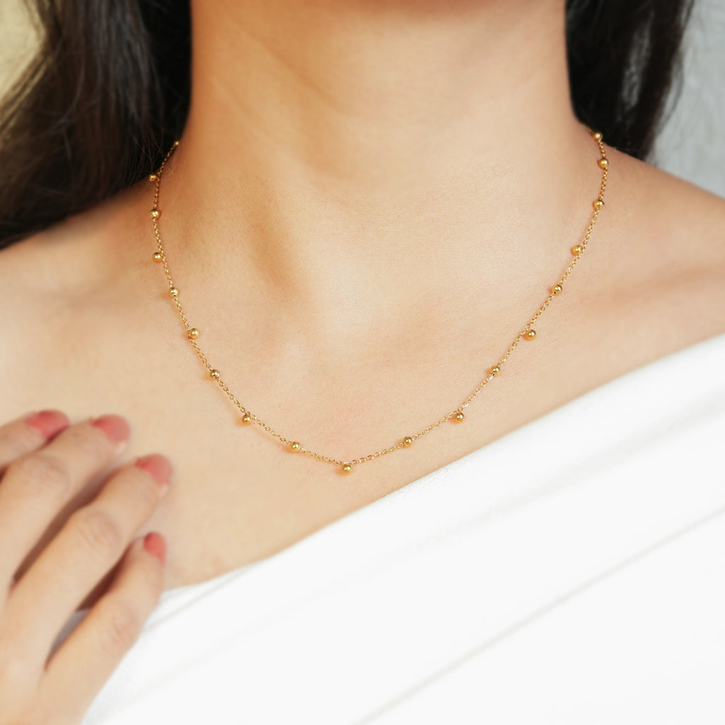 Delicate Golden Bead Drop Necklace