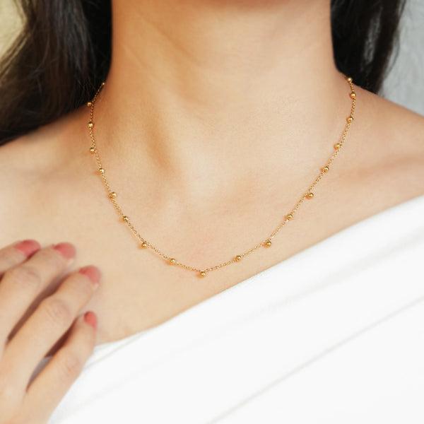 Delicate Golden Bead Drop Necklace