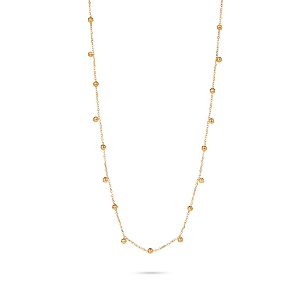Slim gold-tone necklace with evenly spaced small bead-drop details