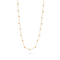Slim gold-tone necklace with evenly spaced small bead-drop details