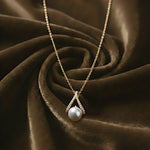 Golden Pearl Drop Charm Necklace
