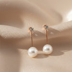 Golden Pearl Swirl Stud Earrings