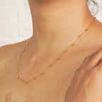 Delicate Golden Bead Drop Necklace